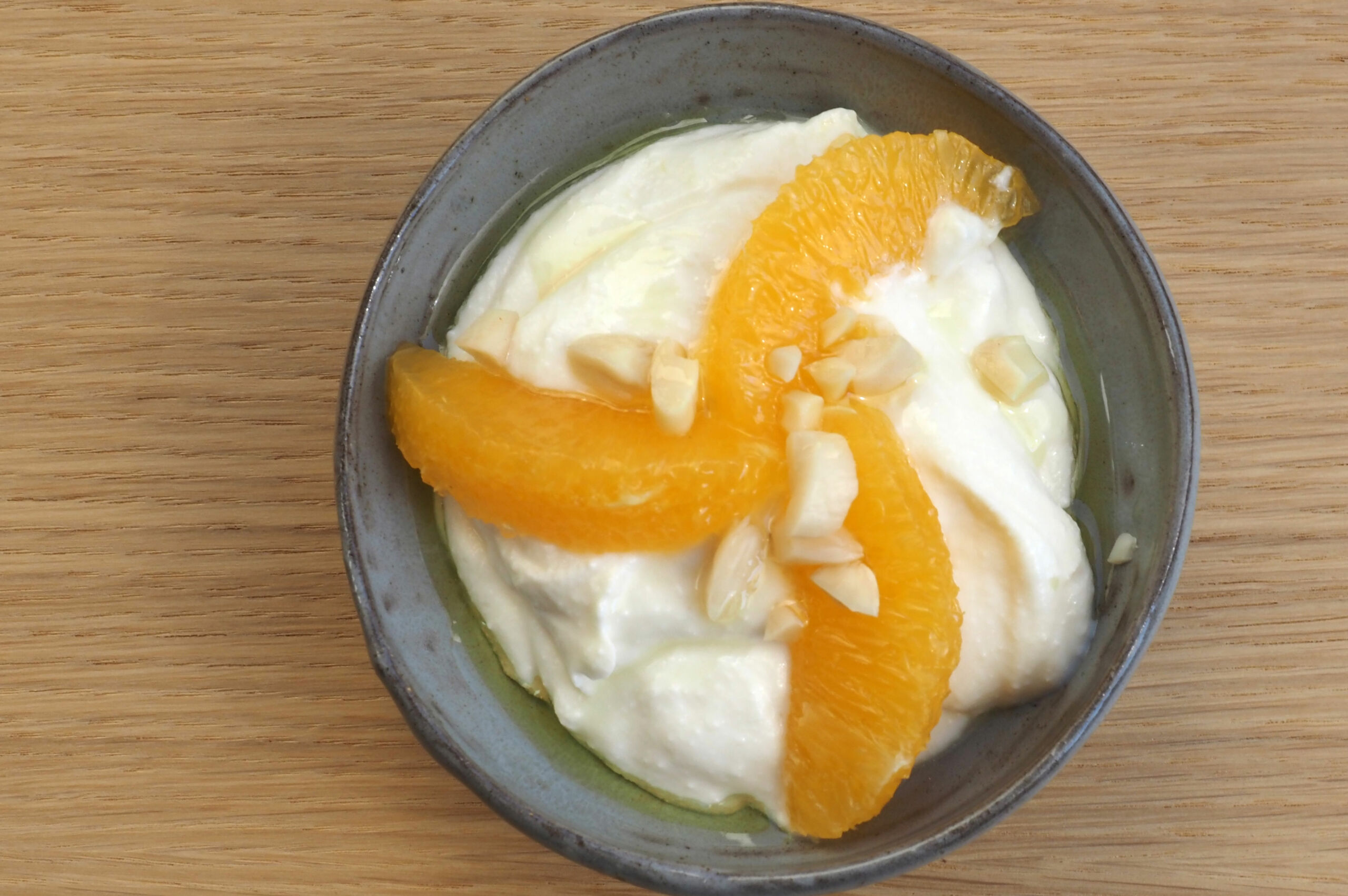 Ricotta mit Orange und Marillen­kernöl